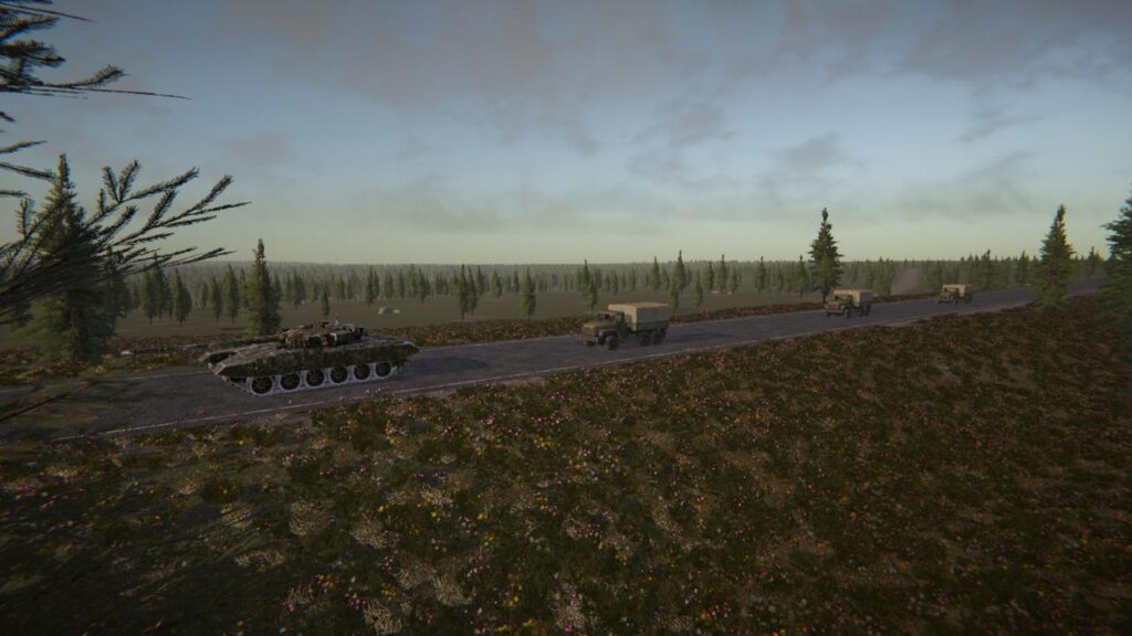 A convoy of military tanks and trucks travels along a winding road through a forested landscape with colorful wildflowers, simulated by BAZU for realistic combat scenarios.