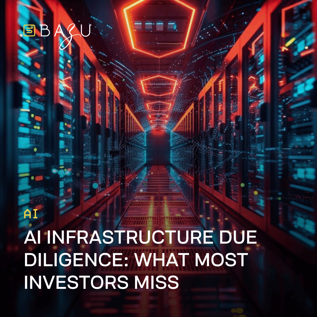 Futuristic data center corridor with rows of glowing server racks illuminated by vibrant neon orange and blue lights, featuring hexagonal ceiling patterns and reflective floors creating an immersive high-tech tunnel effect, overlaid with the BAZU logo and bold text on AI infrastructure due diligence highlighting what most investors miss.