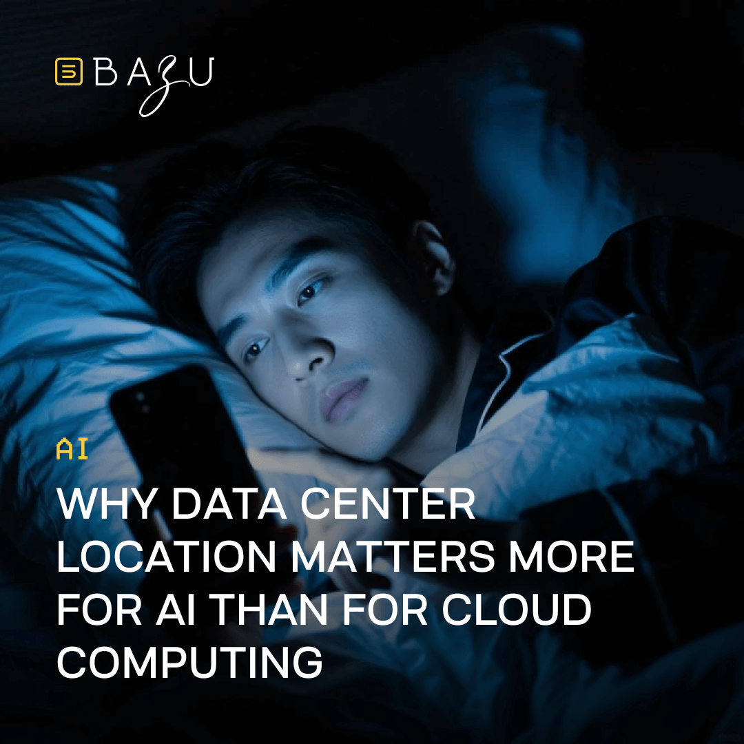 A young man lying in bed at night under dim blue lighting, gazing thoughtfully at his smartphone screen while covered in blankets, creating a moody intimate atmosphere, overlaid with the BAZU logo and bold text explaining why data center location matters more for AI than for traditional cloud computing.