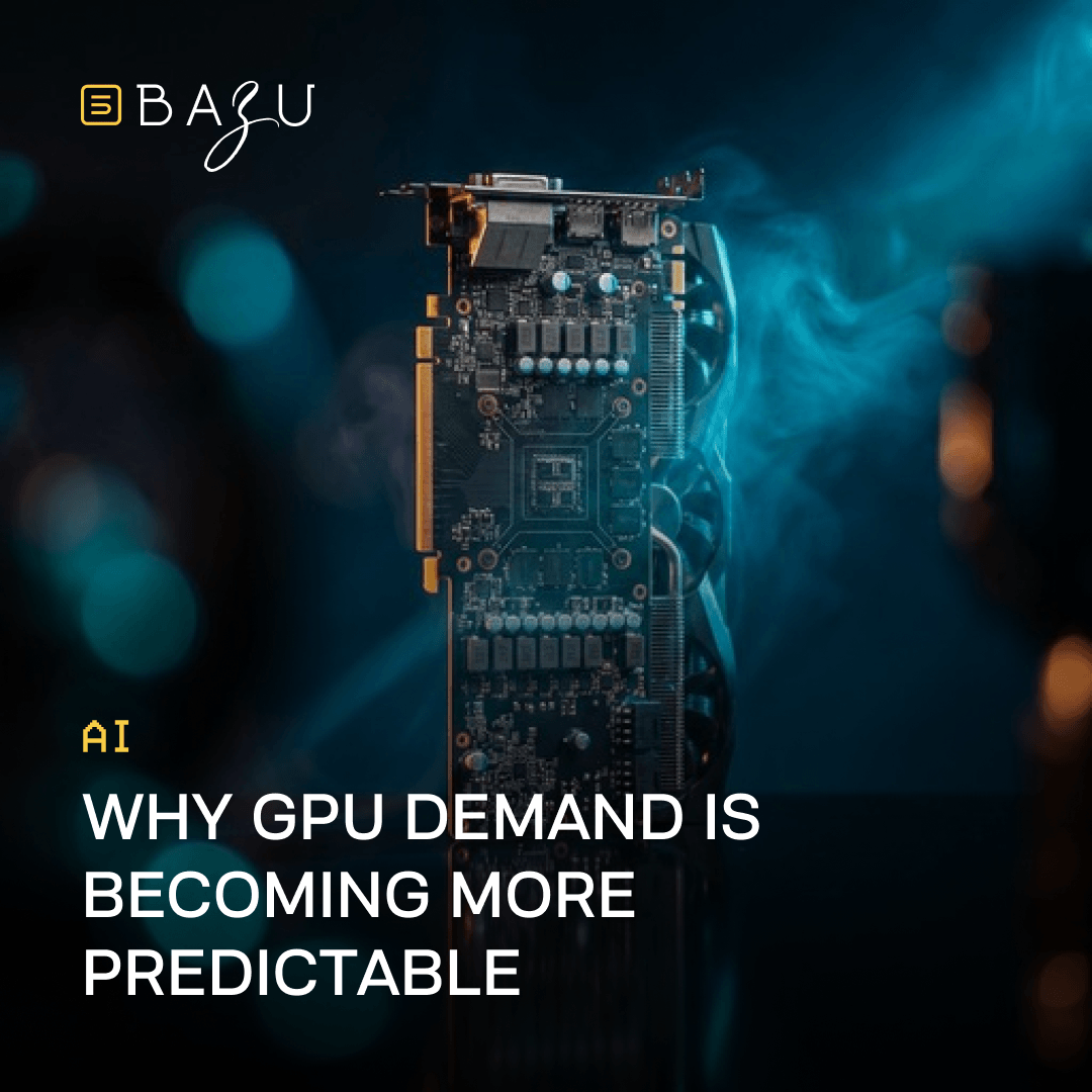 A high-performance GPU graphics card with intricate circuitry and glowing blue smoke effects on a dark background, illustrating why GPU demand is becoming more predictable in the AI landscape, with the BAZU logo.