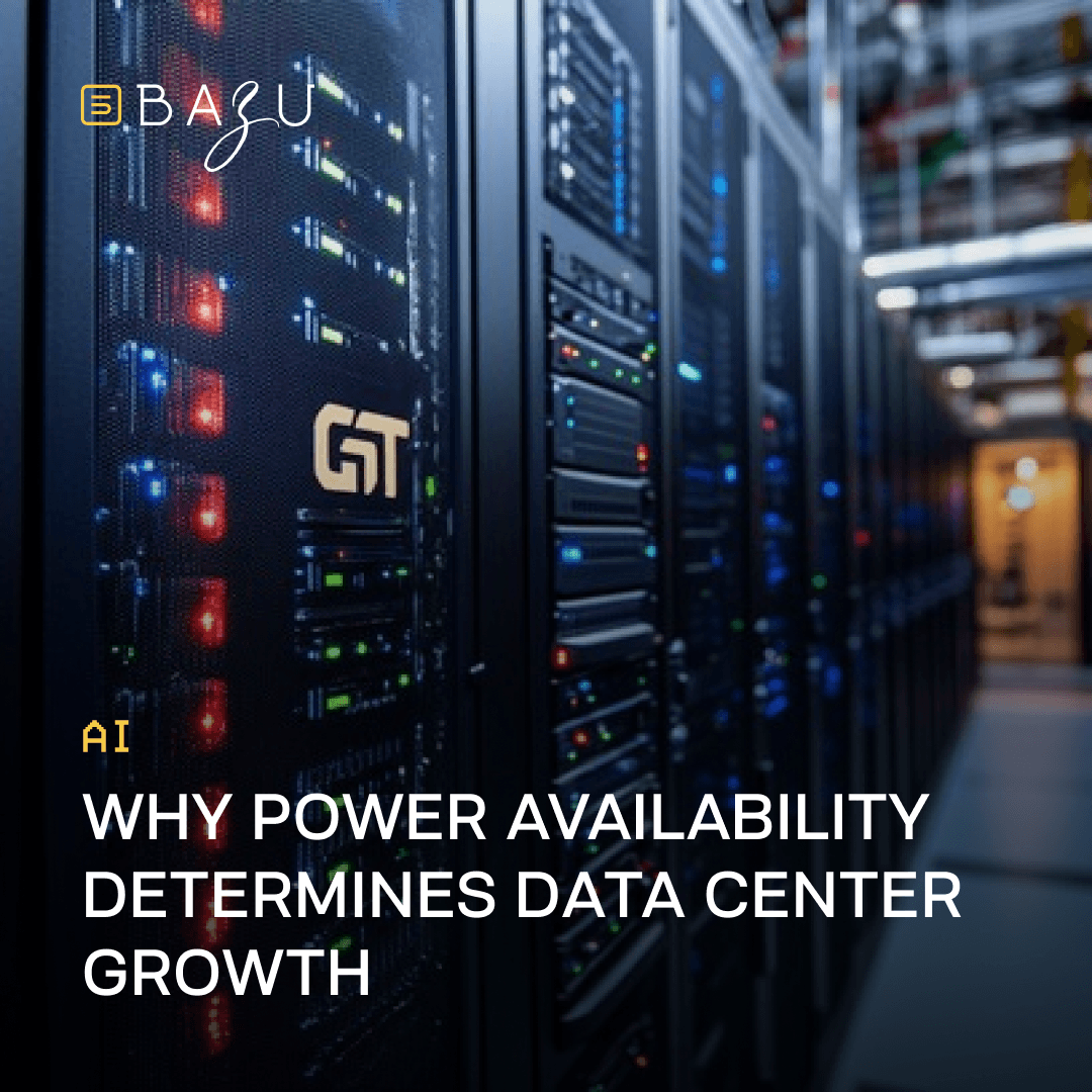 Rows of illuminated server racks in a modern data center corridor with glowing status lights, illustrating why power availability determines data center growth, with the BAZU logo.